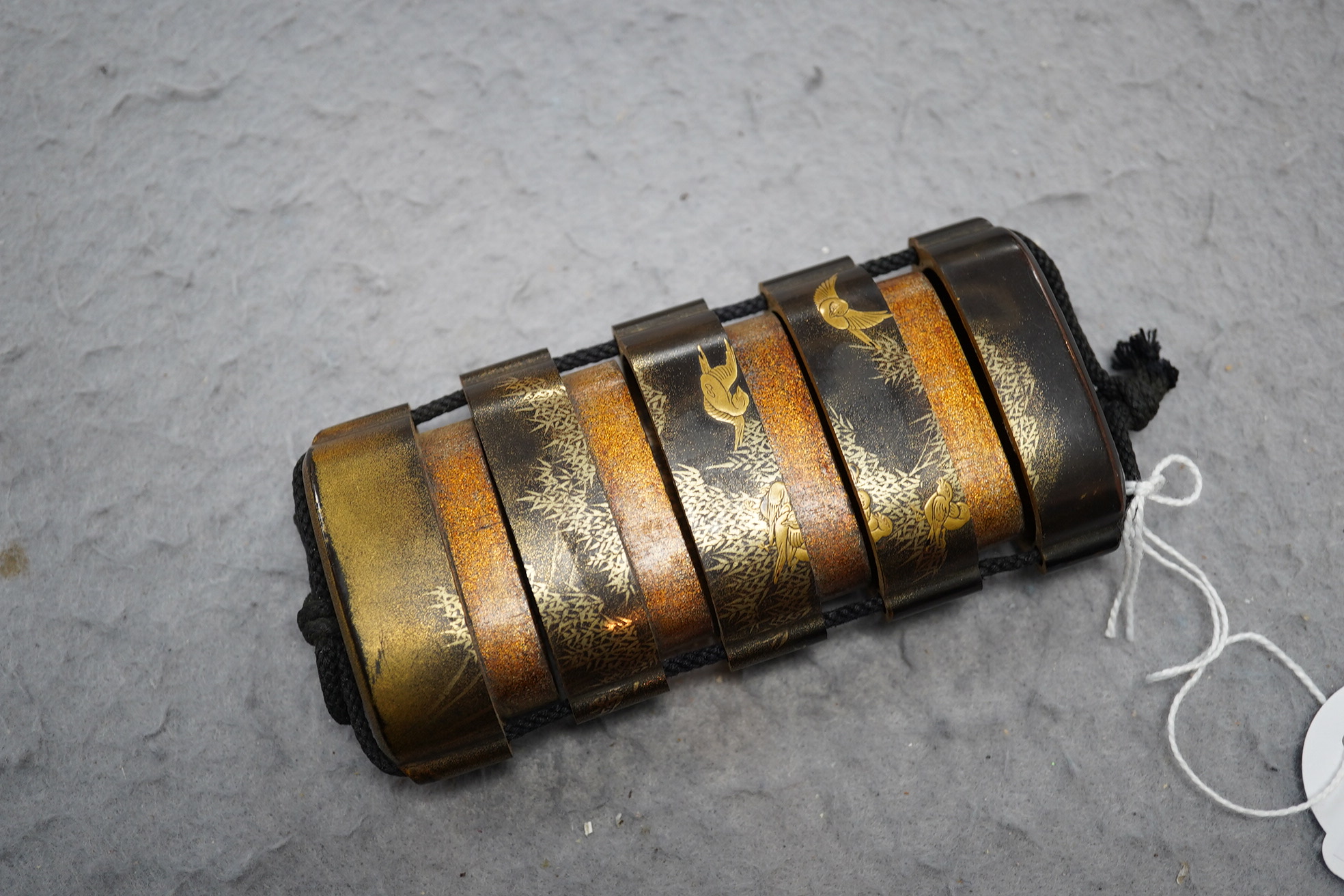 A Japanese gilt lacquer four-case inro, signed, 19th century